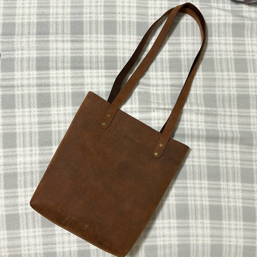 Far.O distressed small leather tote.